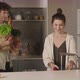 Happy Couple with Grocery Bags on Modern Kitchen - VideoHive Item for Sale