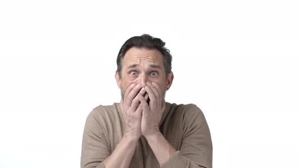 Slowmotion Grandfather Seing Terrifying Thing Grimacing Cover Mouth Gasping From Fear Frowning alt