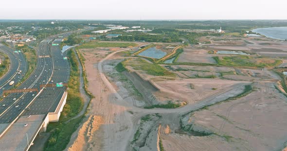 Aerial Top View of Huge Complex Road Junction at Cars Driving on the Alfred E alt