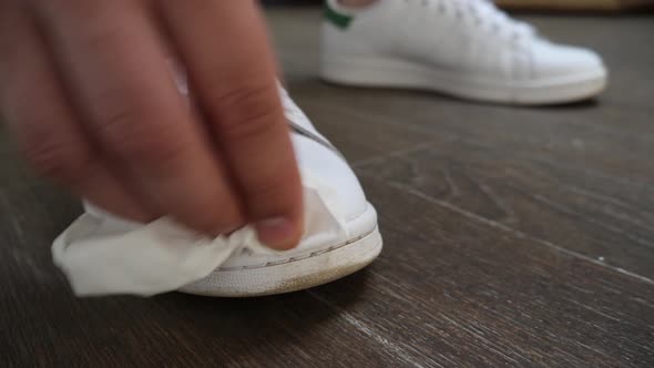 Hand Cleaning Dirty White Shoes
