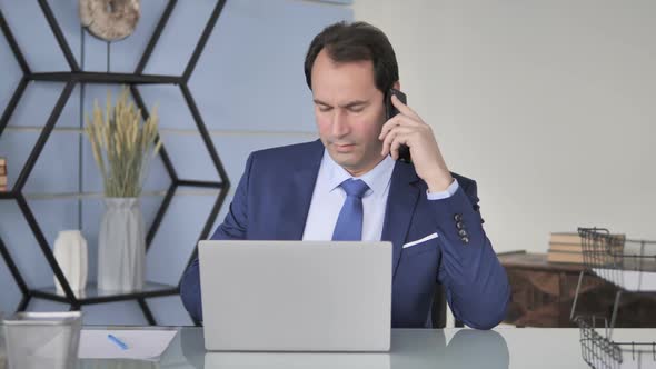 Businesswoman Discussing on Phone Negotiation alt