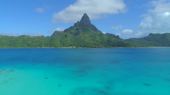 Aerial drone view of the lagoon and Mount Otemanu at Bora Bora tropical island alt