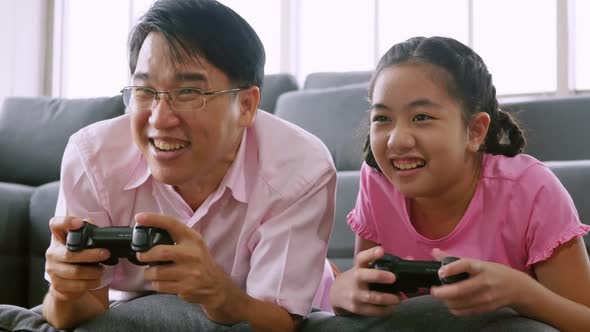 Happy family with father and daughter spending time together at home. alt