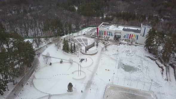 Sportive Area Children Recreation Camp in Forest in Winter, Drone Is Flying