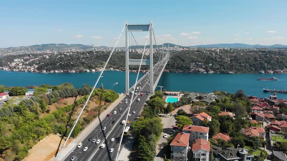 Aerial view of Fatih Sultan Mehmet Bridge and car traffic alt