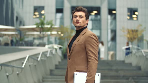 a Man in a Business Suit alt