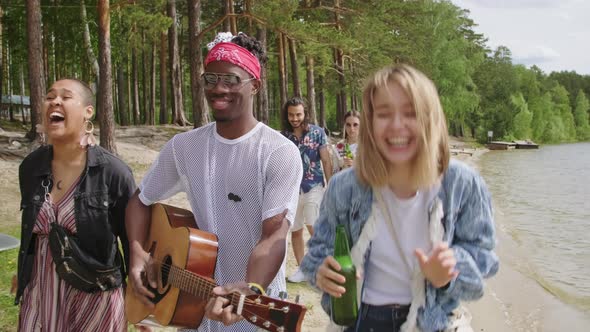 Friends Having Fun On Beach alt