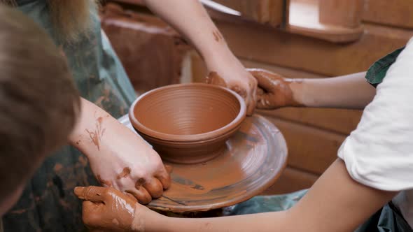 Wheel Potter Hand Clay Shaping
