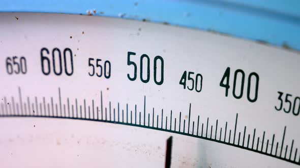 Old weighing dial of scales. Vintage mechanical scales. Libra alt