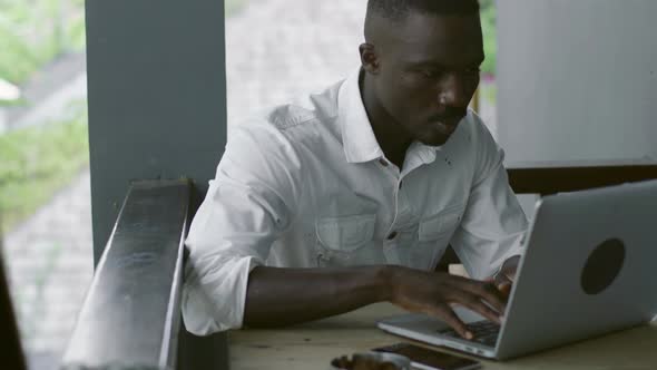 Man Making Work Related Decision alt