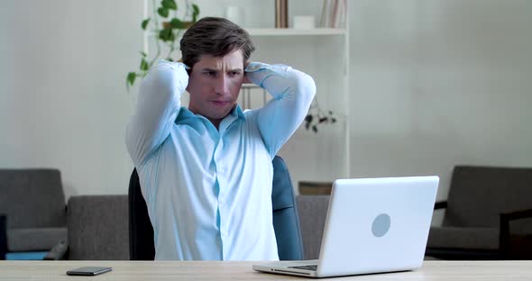 Frustrated Young Business Man Feels Headache Illness, Soreness, Thinks About Difficult Problem alt