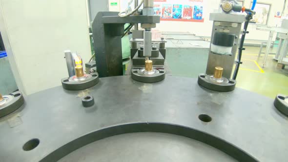 Advanced robotic machine manufacturing parts in an automated assembly line alt