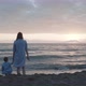 Mother And Baby Looking At Sea - VideoHive Item for Sale