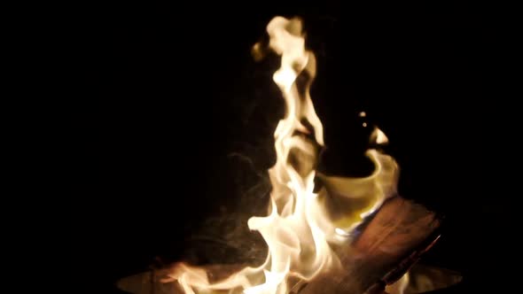 Flames of Fire in slow-motion on a dark background