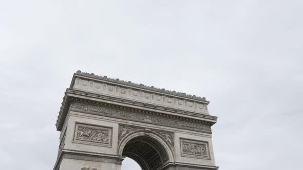 Paris and France  recognizable symbol Arc de Triomphe  by the day 4K 2160p UltraHD tilt footage - Fr alt