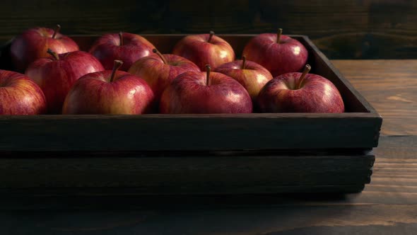 Box Of Red Apples On Table alt