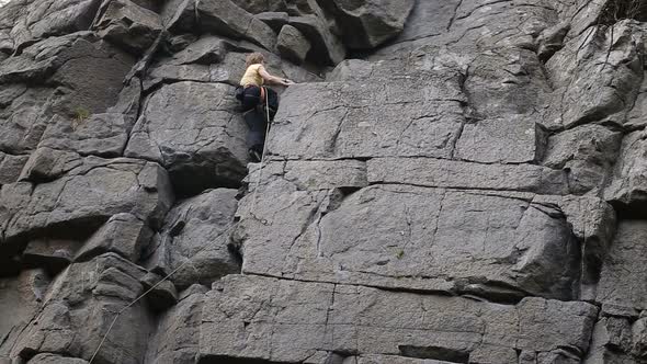 Rock Climber Reaches Top