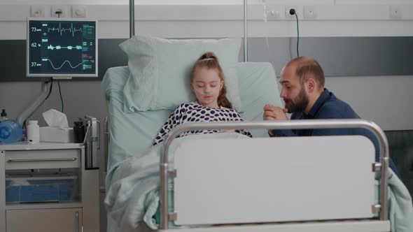 Hospitalized Sick Daughter Sleeping After Suffering Medical Surgery alt