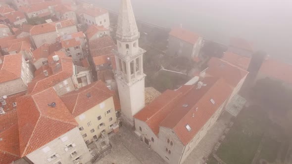 Citadel of the Old Town of Budva in the Fog alt