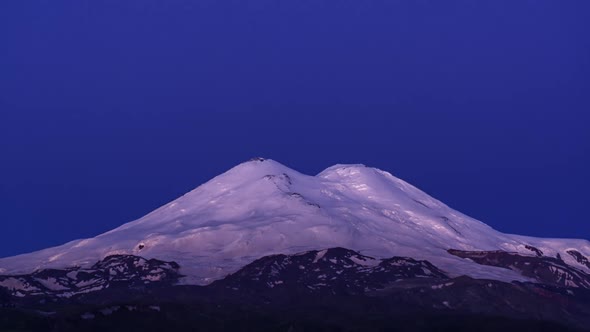 Night Sky Above Mount Elbrus and Sunrise alt