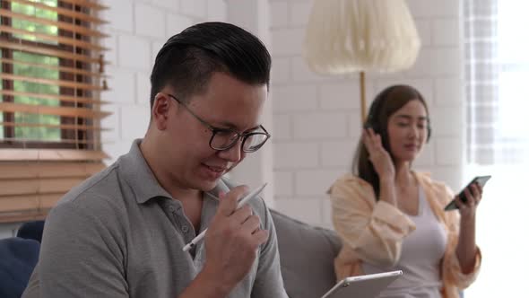 Man and Girl Relax at Home alt