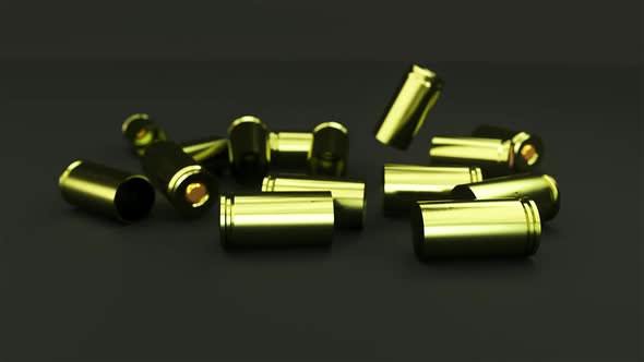 Gold Bullet Casings Fall on Black Surface