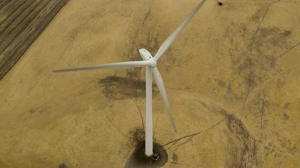 Aerial shot of wind turbines in a field on Montezuma Hills. alt