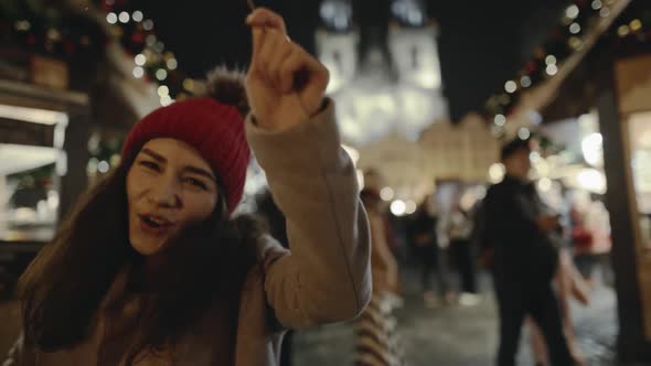 Selfie Time Girl Blogger is Making Video and Photo for Her Social Page at the Street Fair on the alt