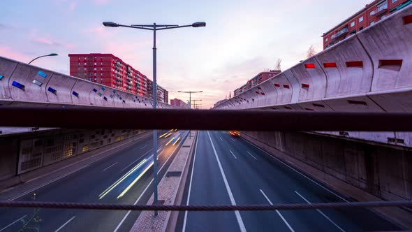 Timelapse of the Sunset and the Passage of Cars on Gran Via in Barcelona