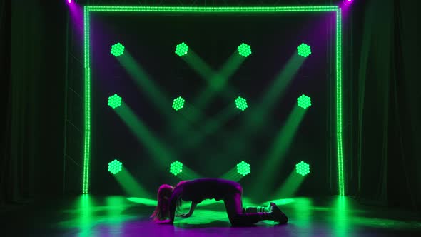 Flexible Young Woman Moves Her Ass Dances Twerk in a Black Leotard alt