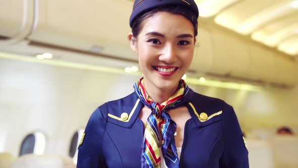 Cabin Crew or Air Hostess Working in Airplane alt