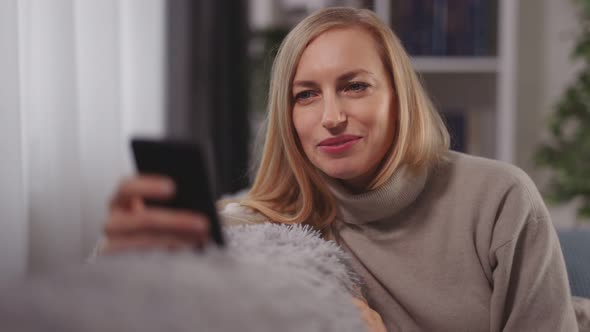 Woman Using Mobile for Videochat