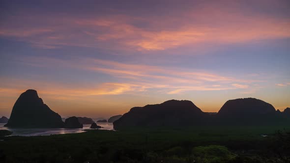 Samet Nangshe viewpoint over Phnag-nga Bay during sunrise, near Phuket, Thailand - Time Lapse