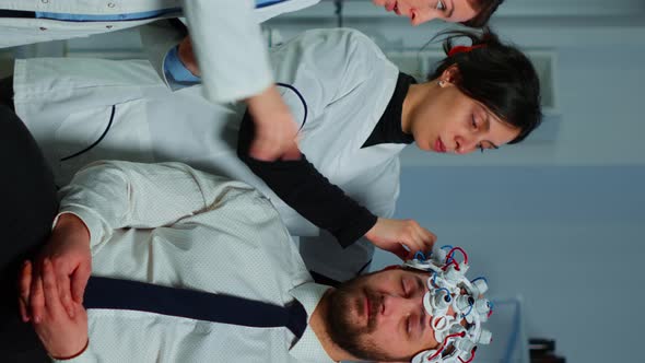 Vertical Video Neurological Researchers Explaning Treatment Result alt