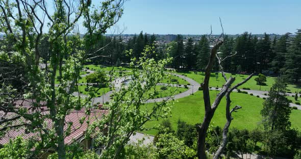 Zugdidi, Georgia - May 30 2022: Aerial view of Dadiani Palace in the center of Zugdidi city alt