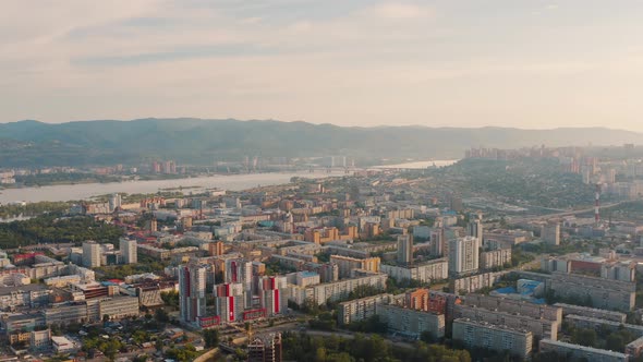 General view of Krasnoyarsk taken by drone Communal bridge of Krasnoyarsk alt