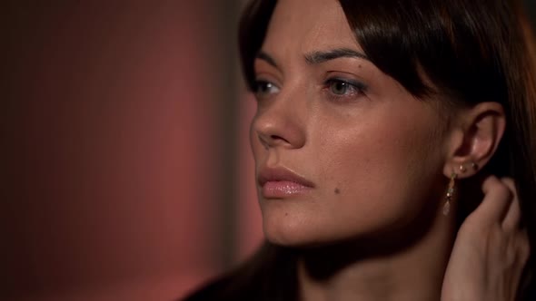 Young Woman Is Listening Someone, Closeup of Face, Interested and Sceptic Look alt