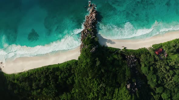 Aerial flat slider over Pointe Belize and Petite Anse Beach alt