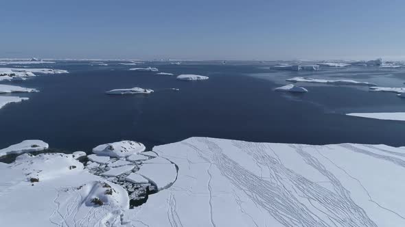 Aerial Flight Over Antarctica Snow Land, Ocean. alt