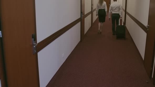 Business Partners Leaving Hotel alt