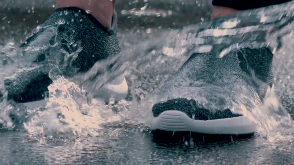 Water Poured on Sneakers Closeup