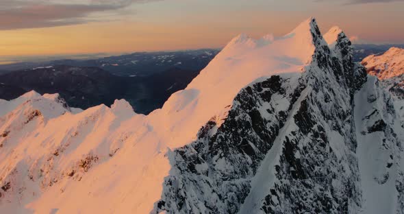 Orange Glowing Snowy Mountain Peak North Cascades Washington State alt