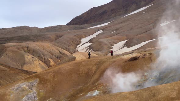 Tourists Walk in Kerlingarfjoll Geotermal Area alt