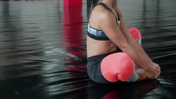 Unrecognizable Yoga Woman Sitting in Upward Facing Butterfly Pose Indoor alt