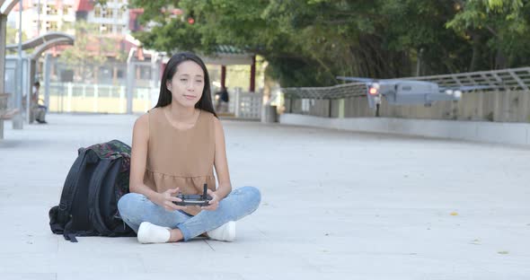 Woman control flying drone and accident occurs alt