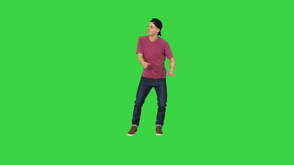 Caucasian Man Rapper Does Some Stylish Light Dancing on a Green Screen ...