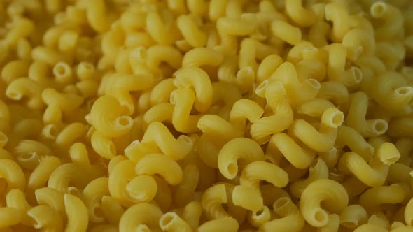 a Lot of Pasta Close-up. Macron Products Close, Rotating. View From Above. 