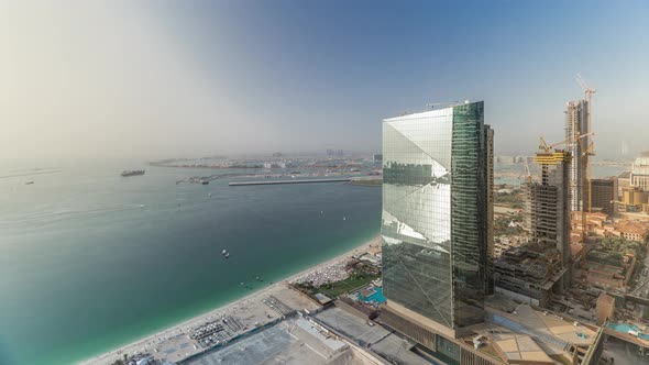 Modern Skyscrapers in Jumeirah Beach Residence in Dubai JBR Aerial Timelapse alt