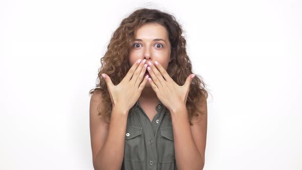 Young Pretty Lady in Grey Shirt Expressing Excitement and Happiness Like Winning in Lottery Closeup alt
