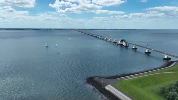 Zeelandbridge Infinity Bridge in the Distance Aerial Drone View alt
